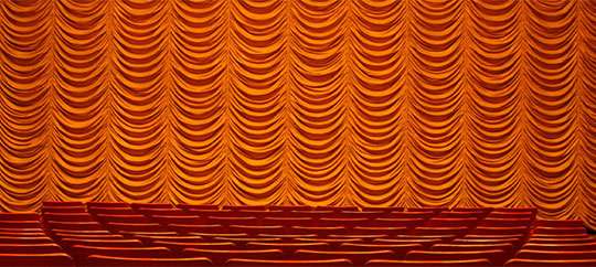 Cinestudio's custom gold Austrian shade curtain