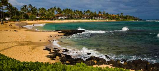 Surfing or Bodysurfing Poipu Beach